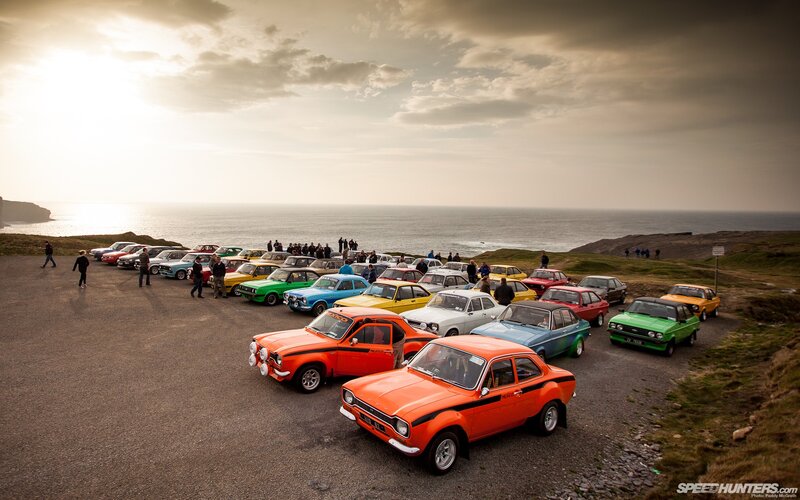 Classic cars at coastal gathering