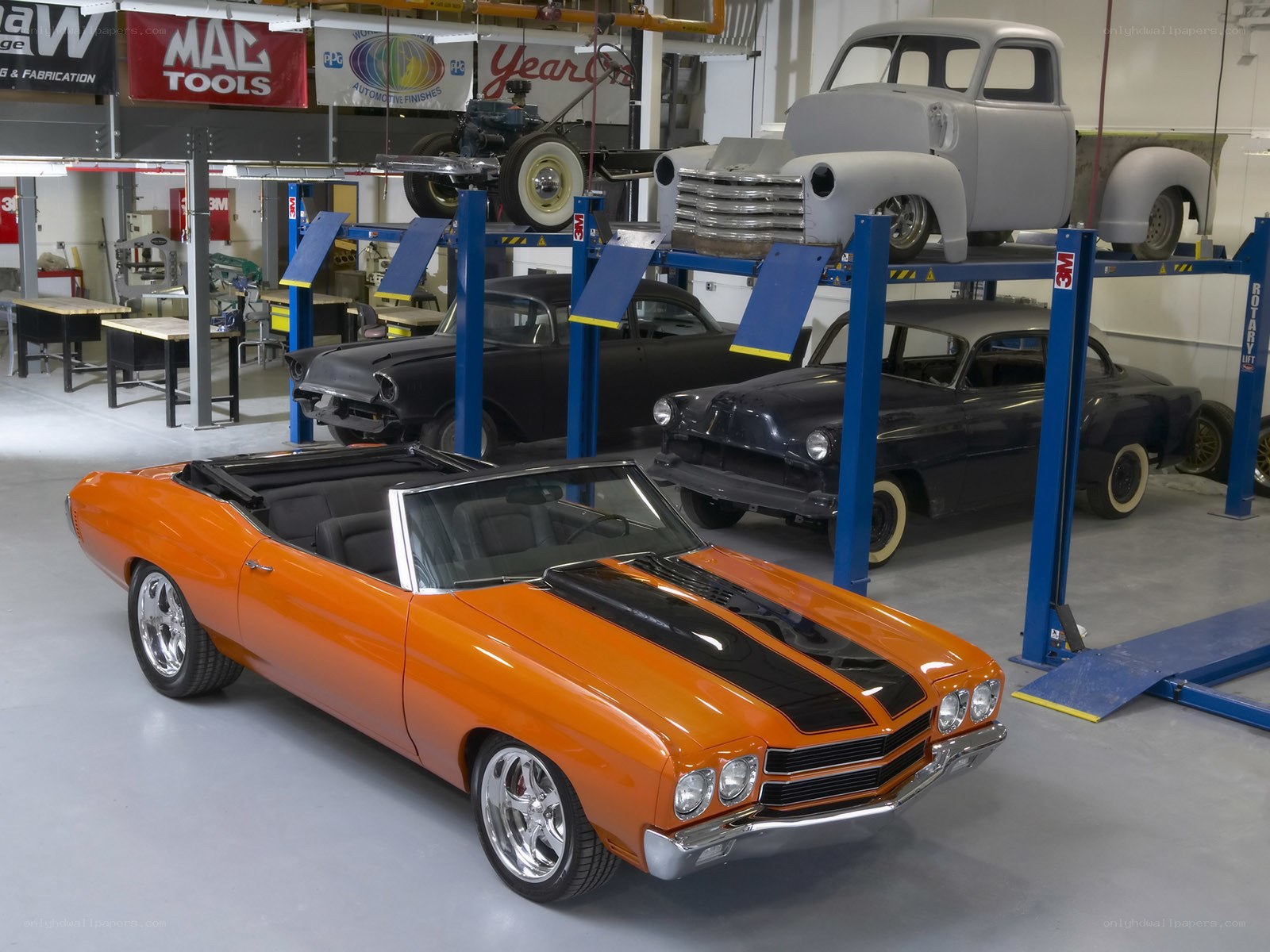 Classic cars in a workshop