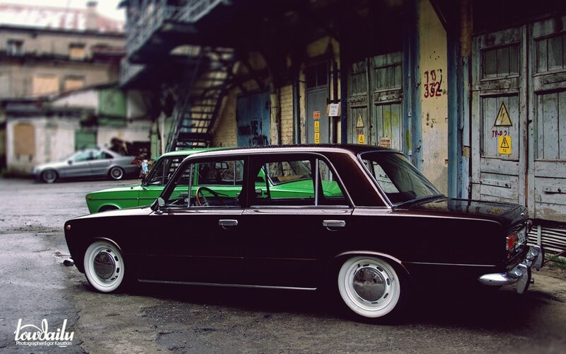 Classic cars in an urban alley