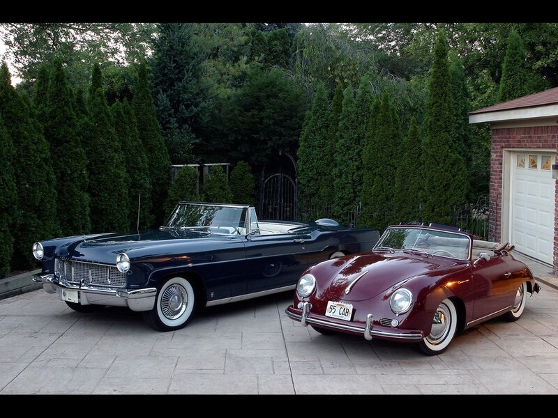 Classic cars in driveway