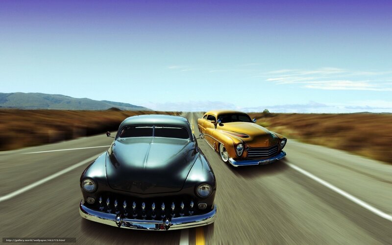 Classic cars on a desert road