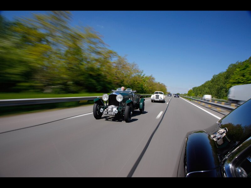 Classic cars on a highway