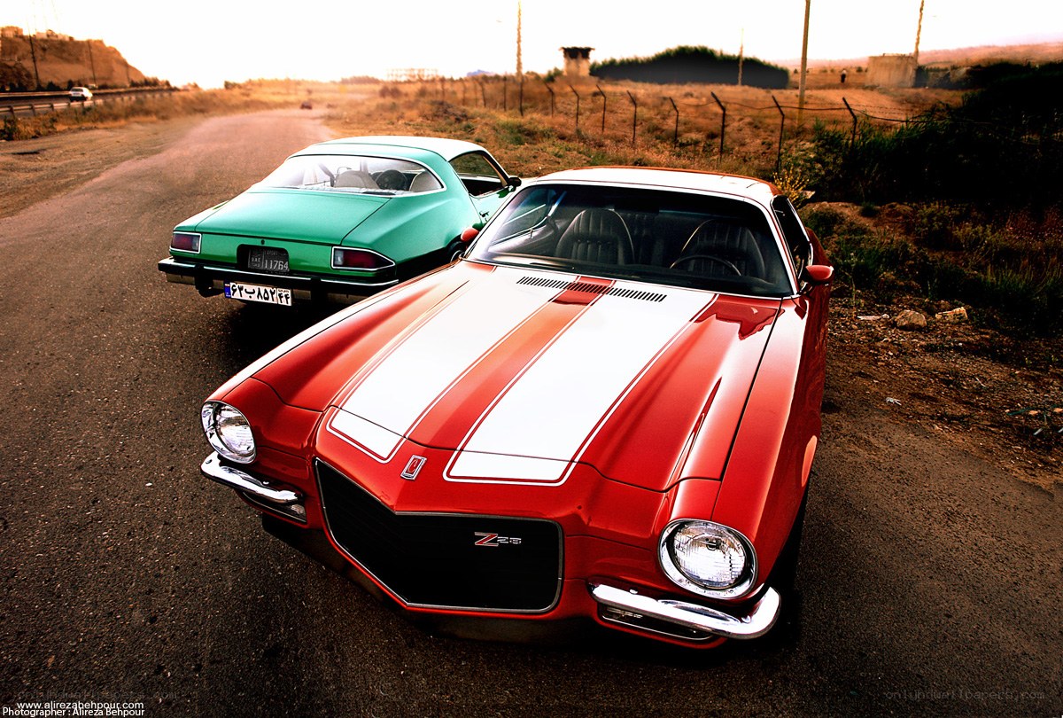 Classic cars on a road