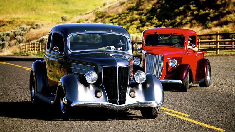 Classic cars on a scenic road