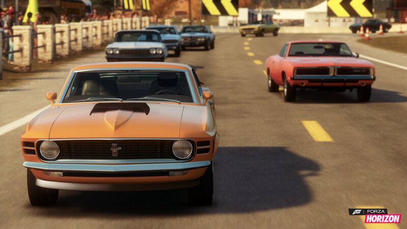 Classic cars racing on a track