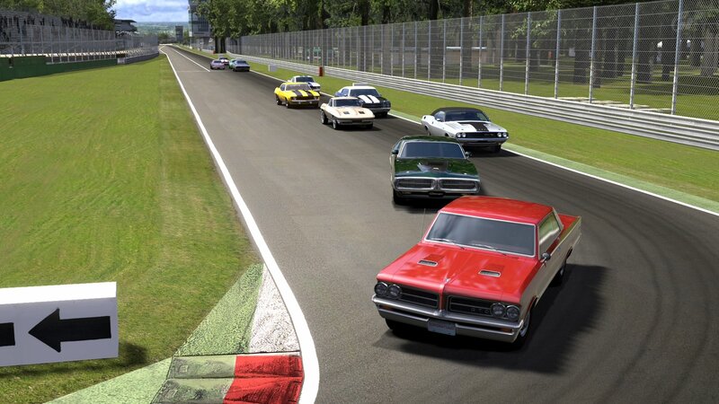 Classic cars racing on a track