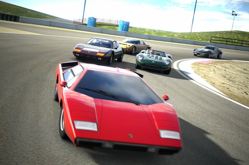 Classic cars racing on a track