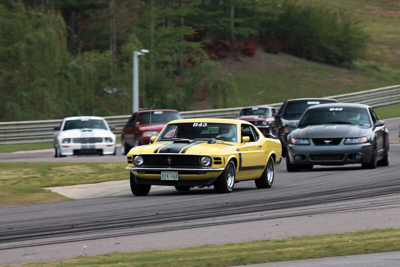 Classic cars racing on a track