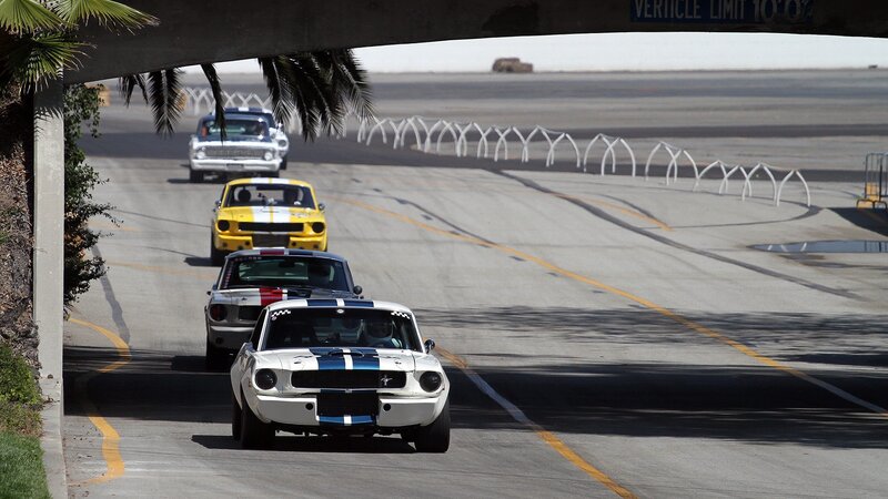 classic cars racing on track