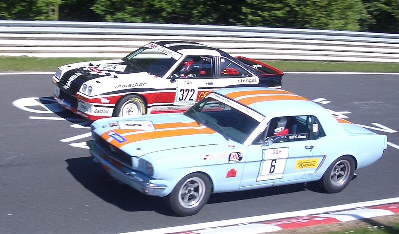 Classic cars racing on track