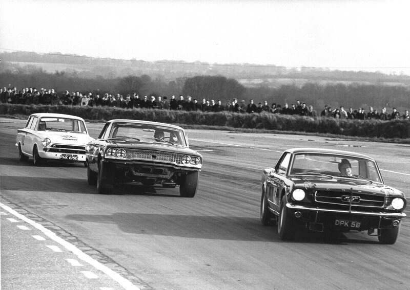 Classic cars racing on track