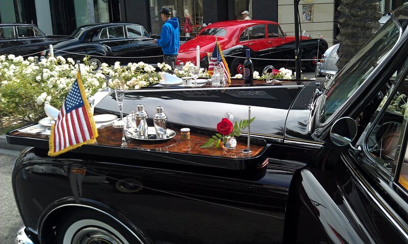 Classic cars with American flags