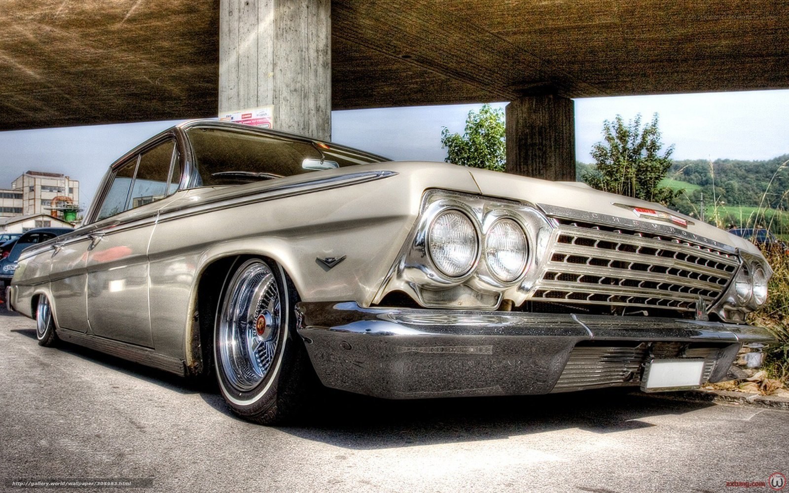 classic chevrolet under overpass