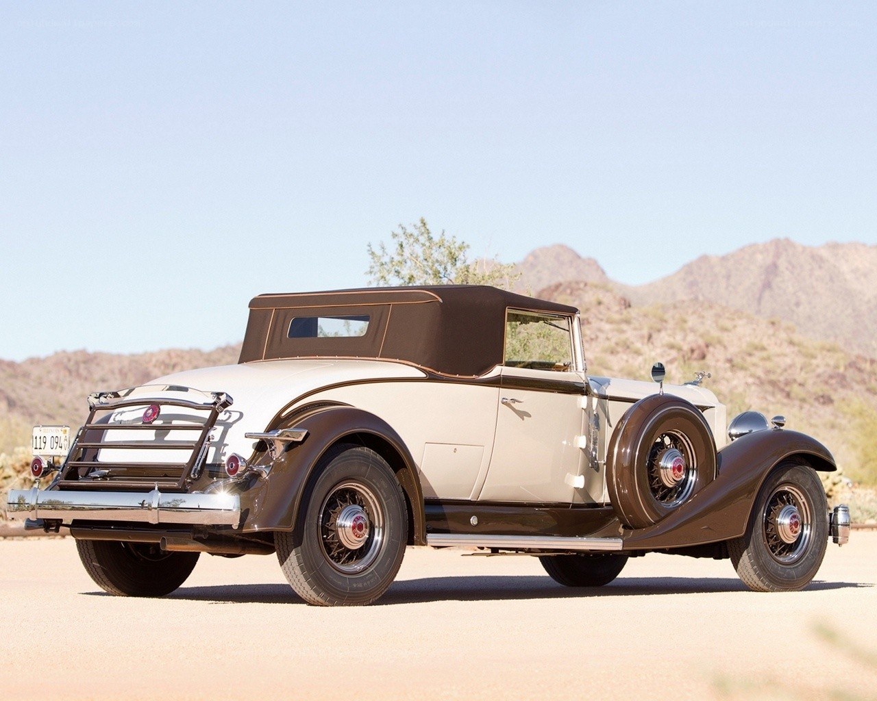 Classic convertible car in desert