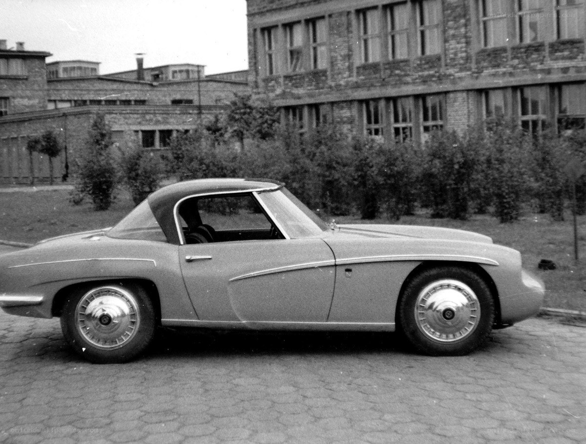 Classic convertible car on cobblestones
