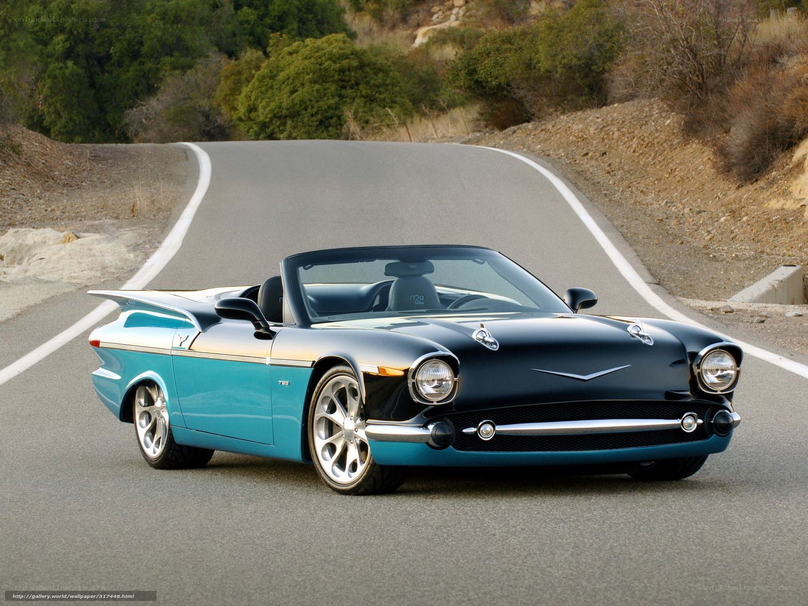 Classic convertible on winding road