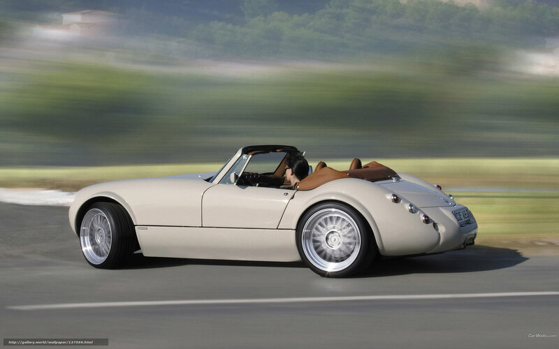 Classic convertible sports car in motion