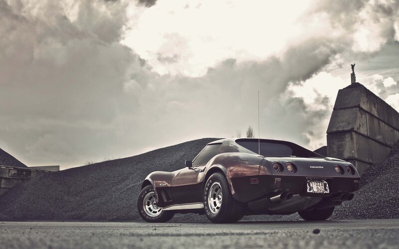 Classic Corvette on gravel lot
