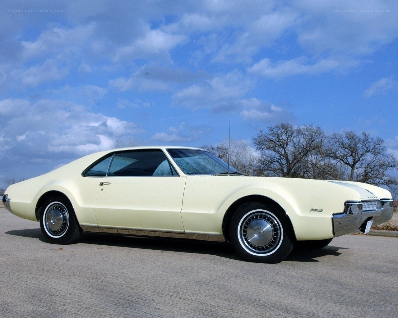Classic cream-colored Oldsmobile Tornado
