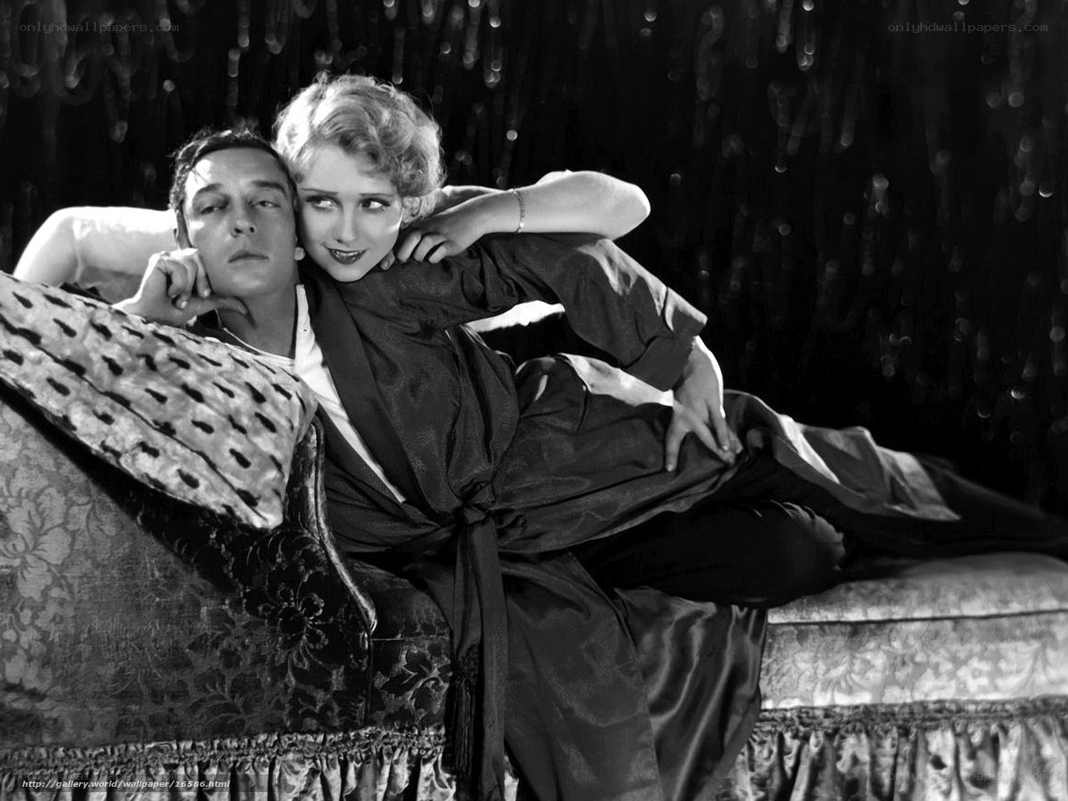 Classic film couple on couch