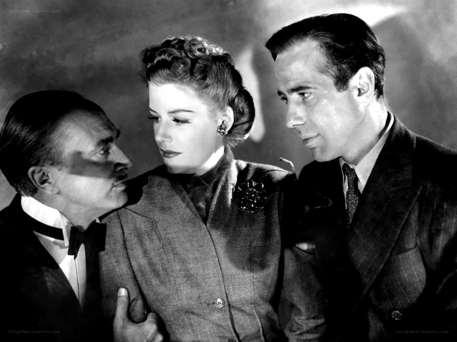 Classic film scene with three actors