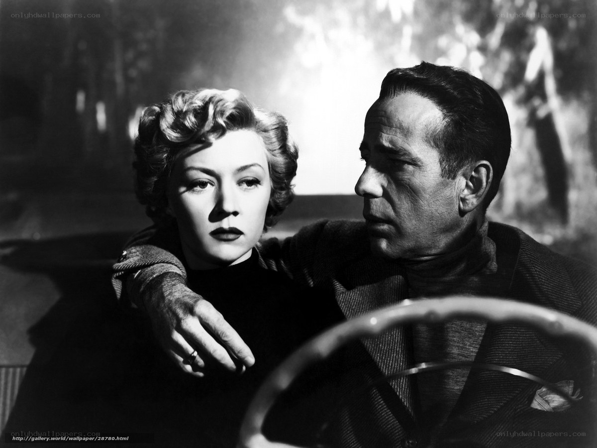 Classic film still of couple in car