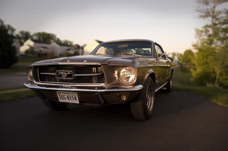 Classic Ford Mustang in driveway