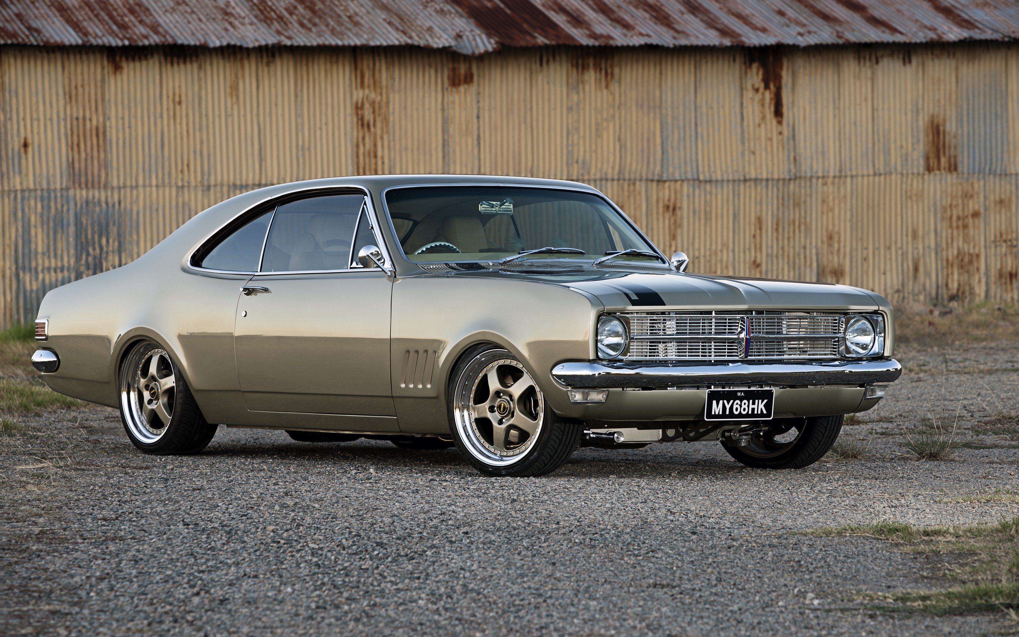 classic gold coupe car