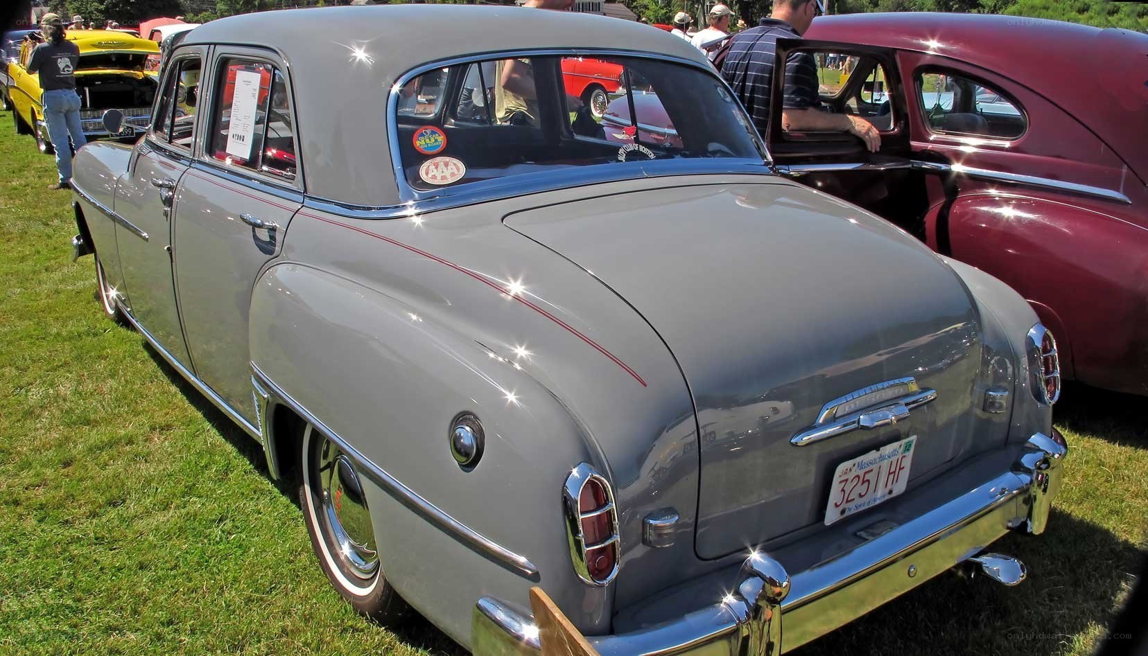 Classic gray car at a show