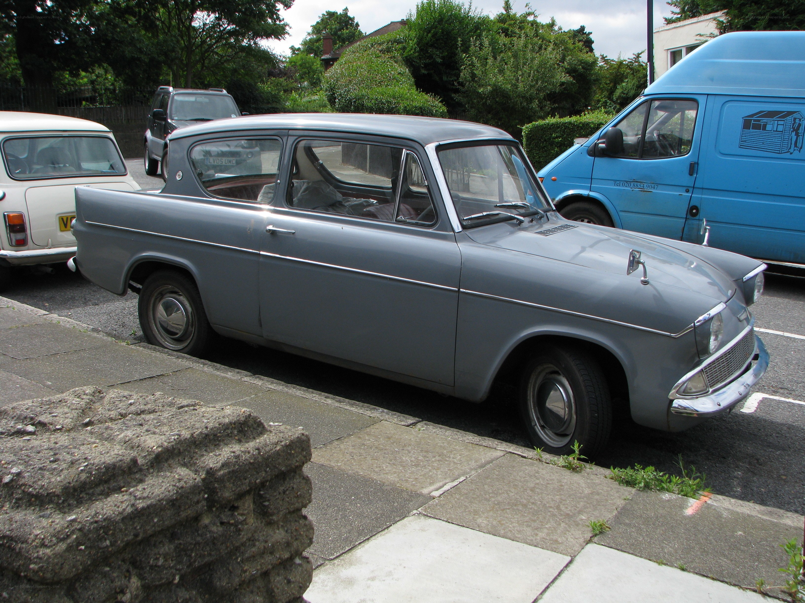Classic gray car parked on street