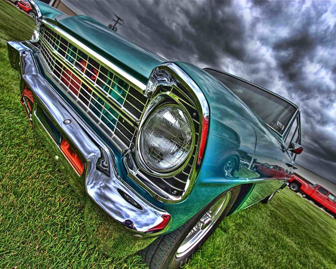 Classic green car at a show
