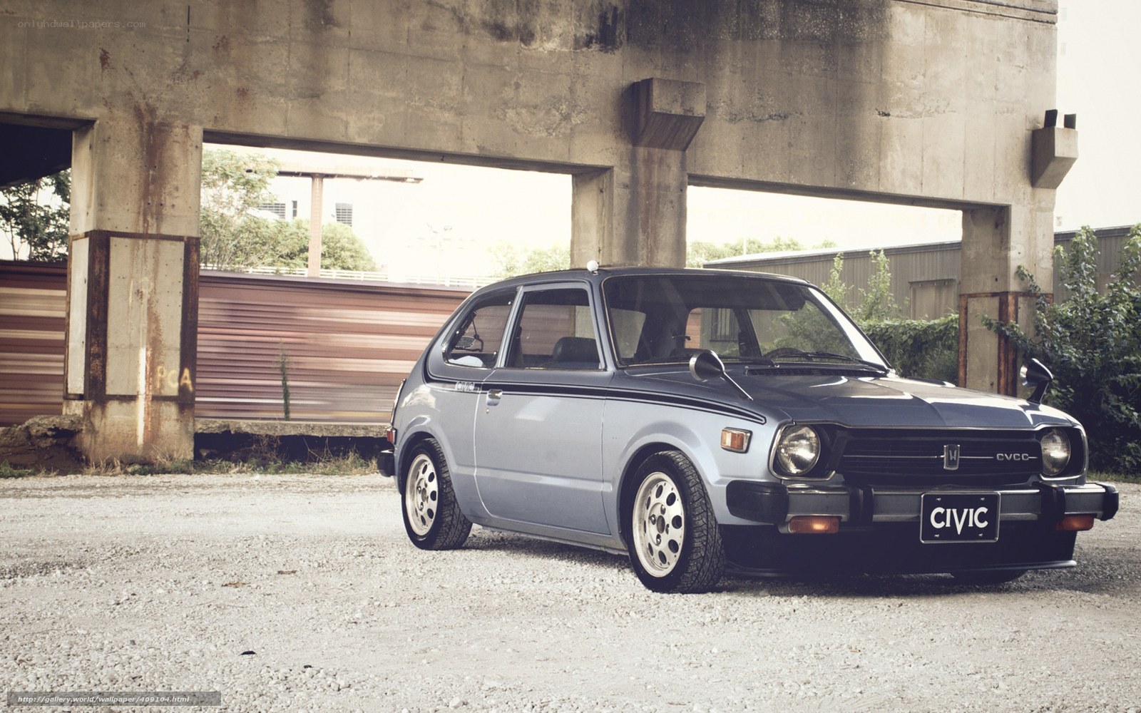Classic Honda Civic under overpass