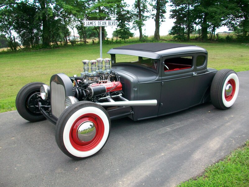 Classic hot rod on a country road
