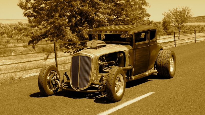 classic hot rod on country road