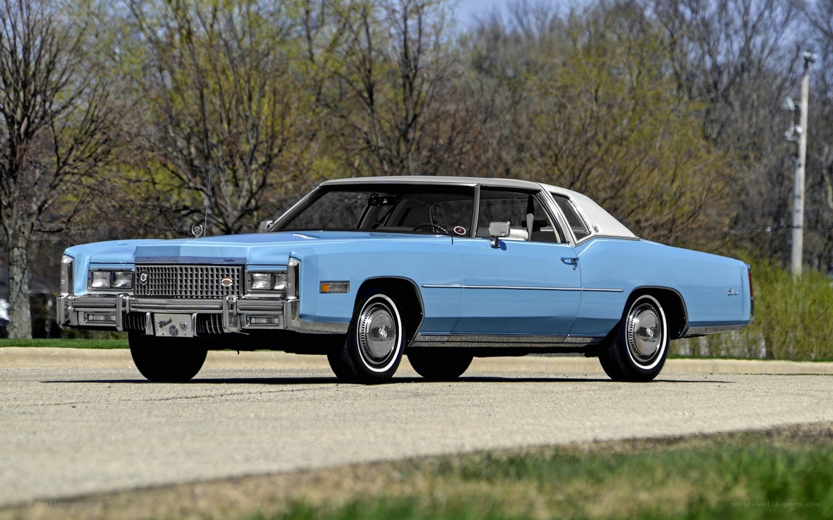 Classic light blue Cadillac coupe