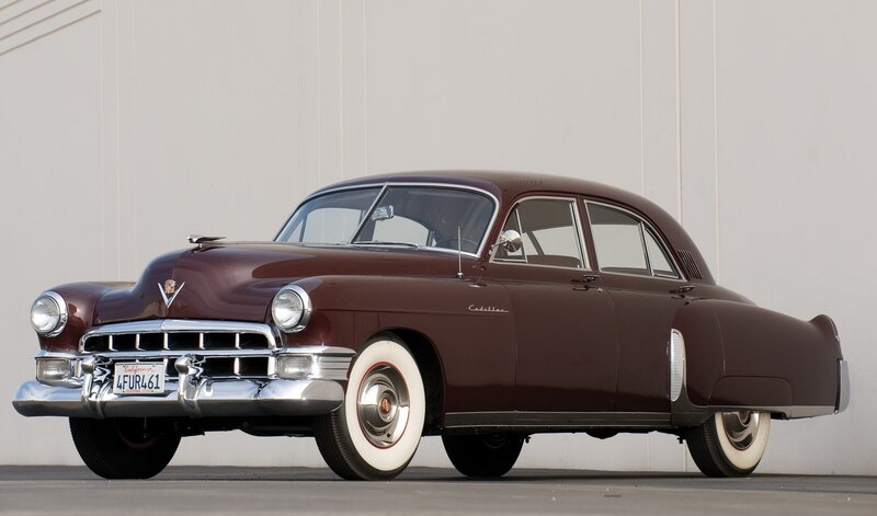 Classic maroon Cadillac sedan