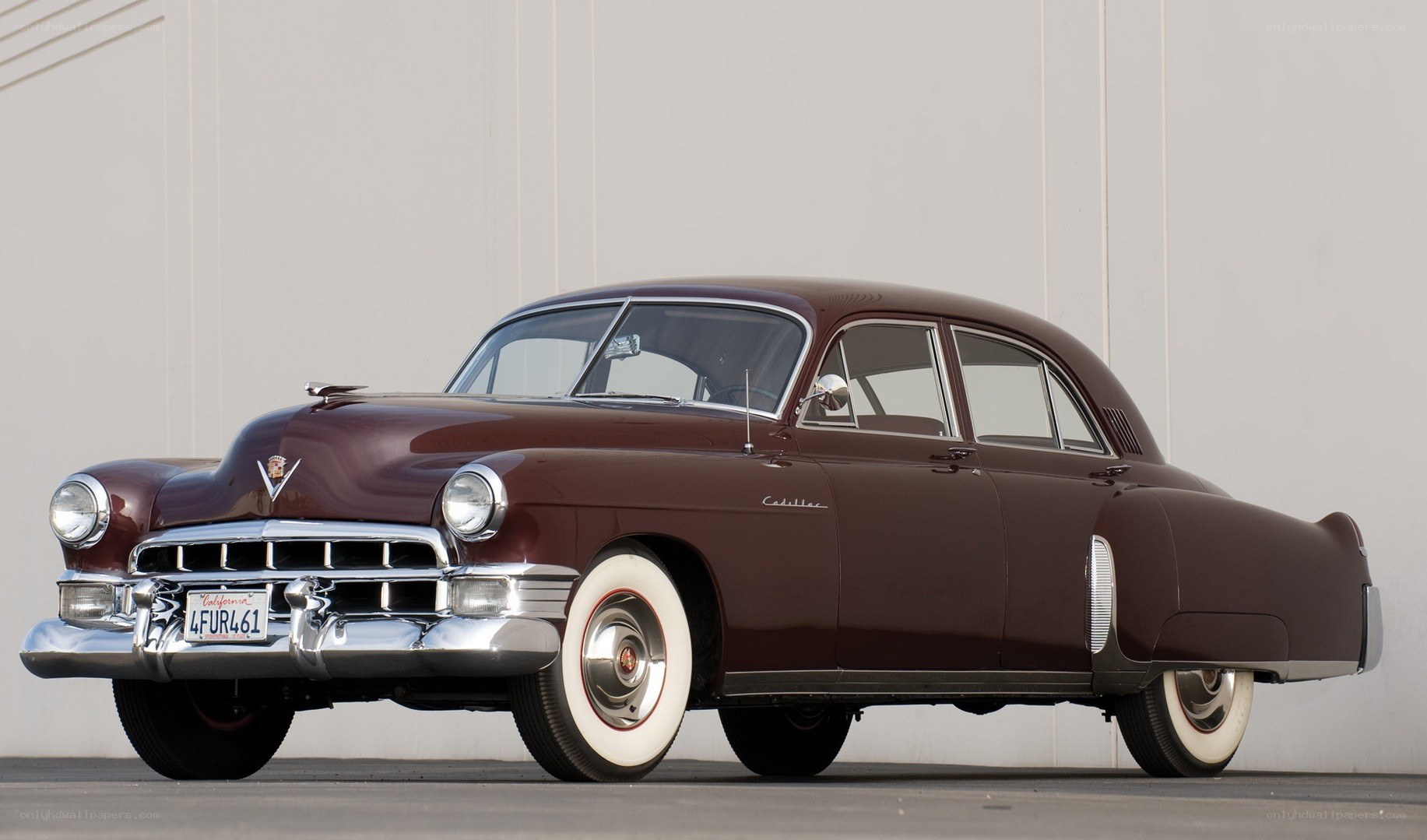 Classic maroon Cadillac sedan