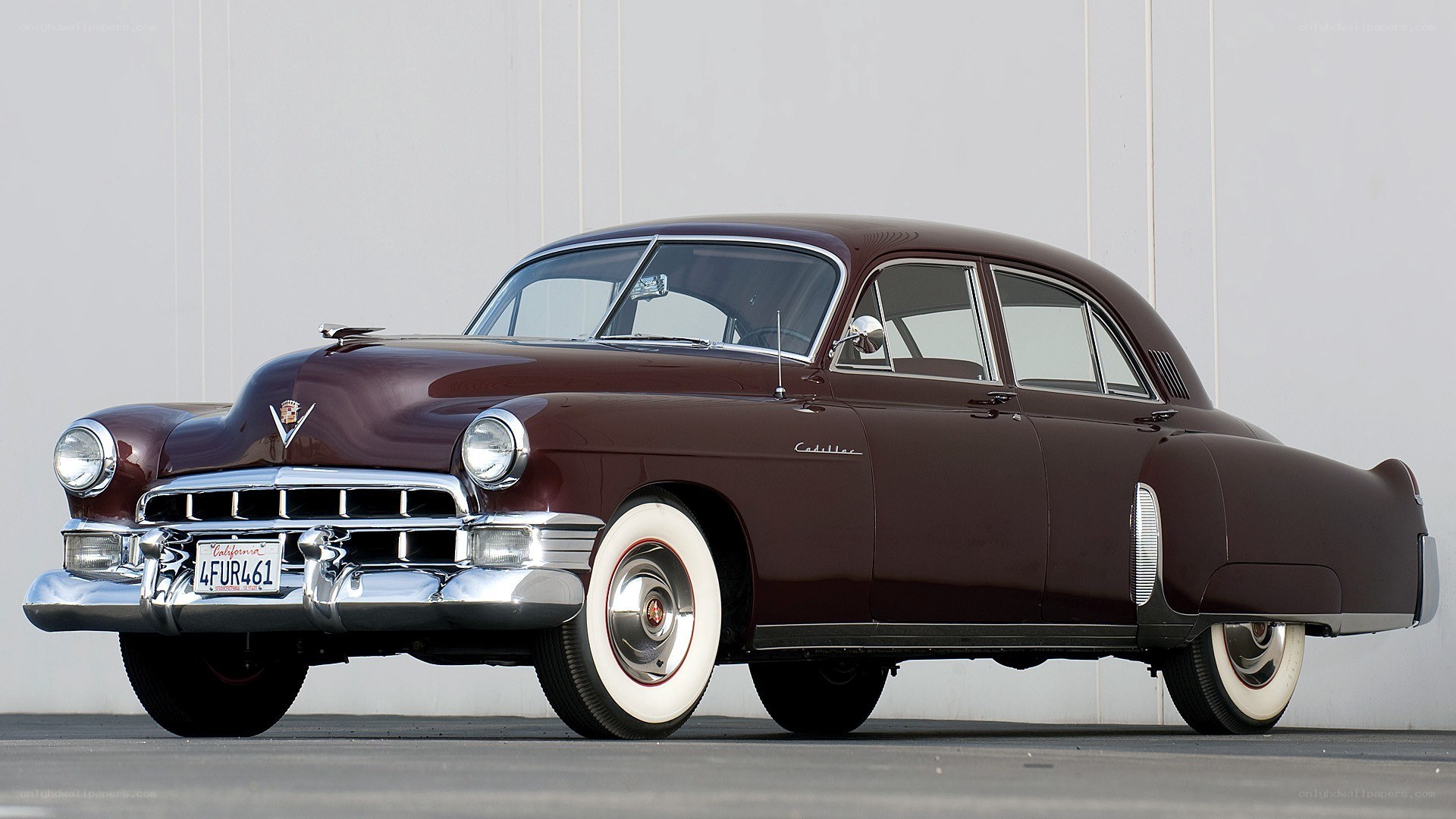 Classic maroon Cadillac sedan