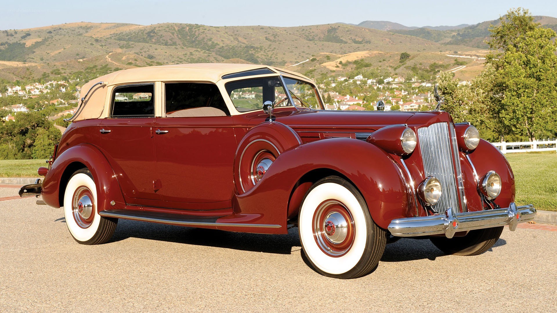 Classic maroon convertible car