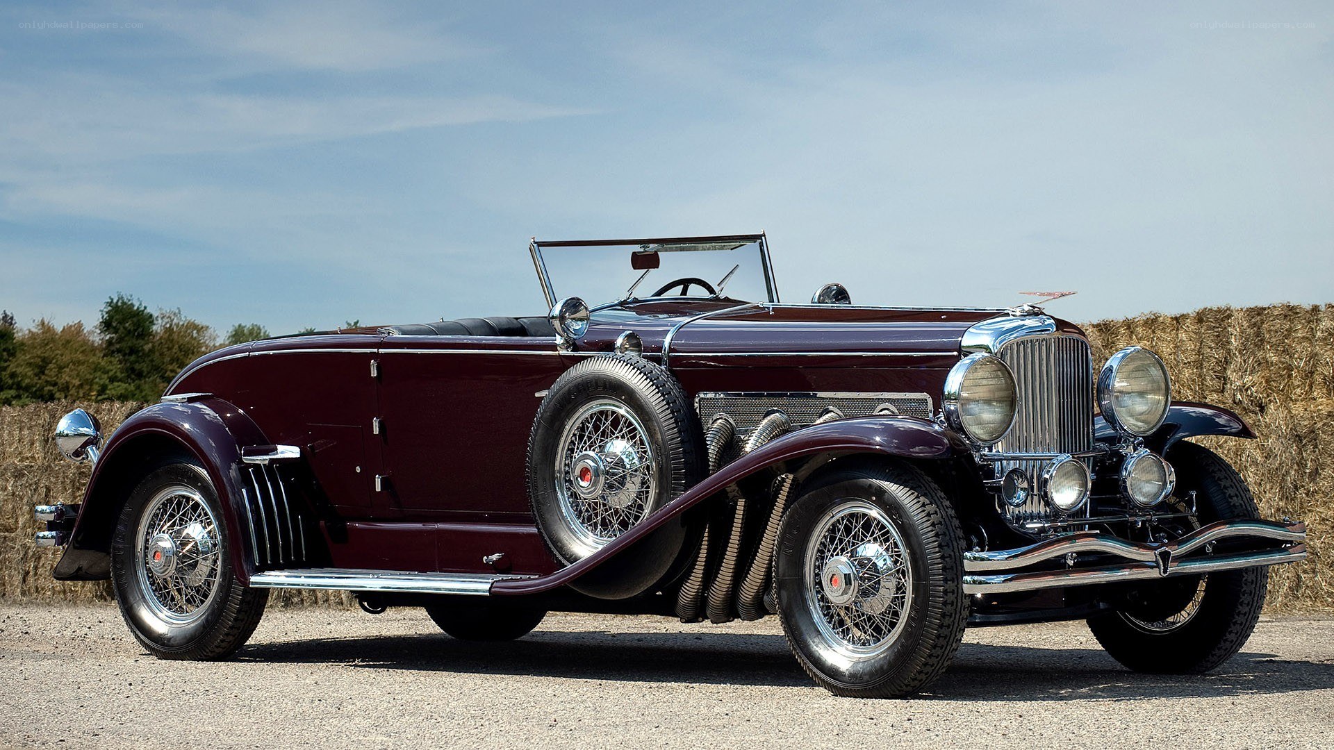 Classic maroon convertible car