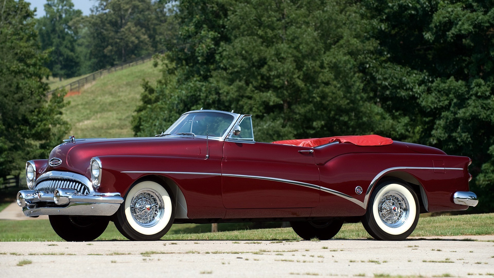 Classic maroon convertible car