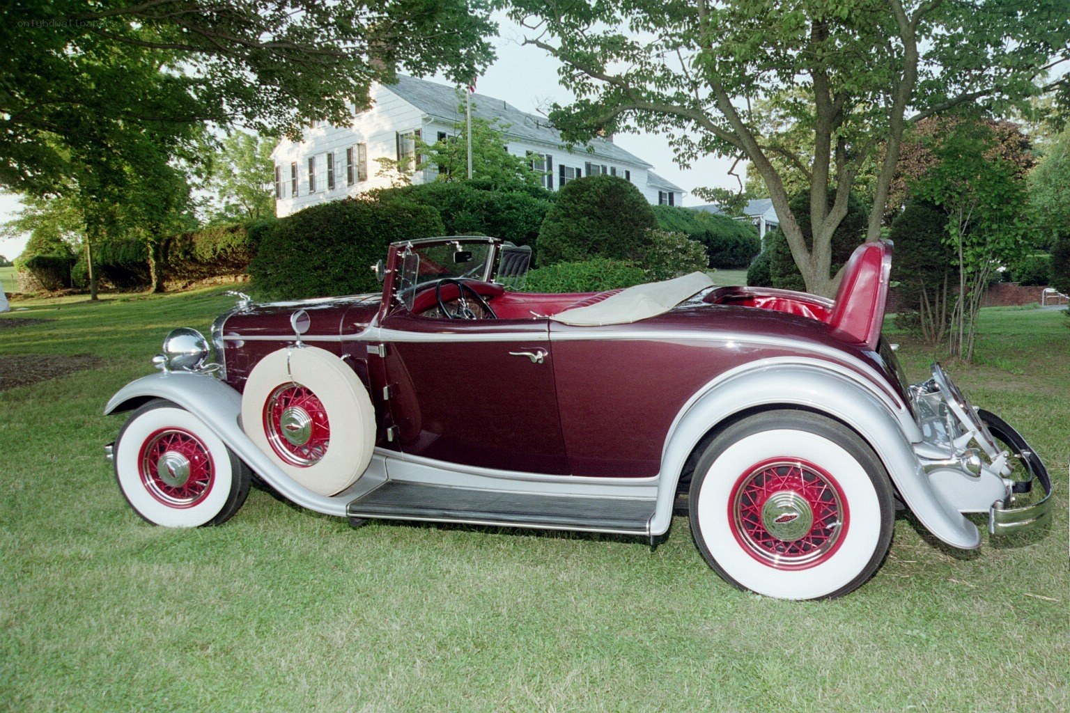 Classic maroon convertible car