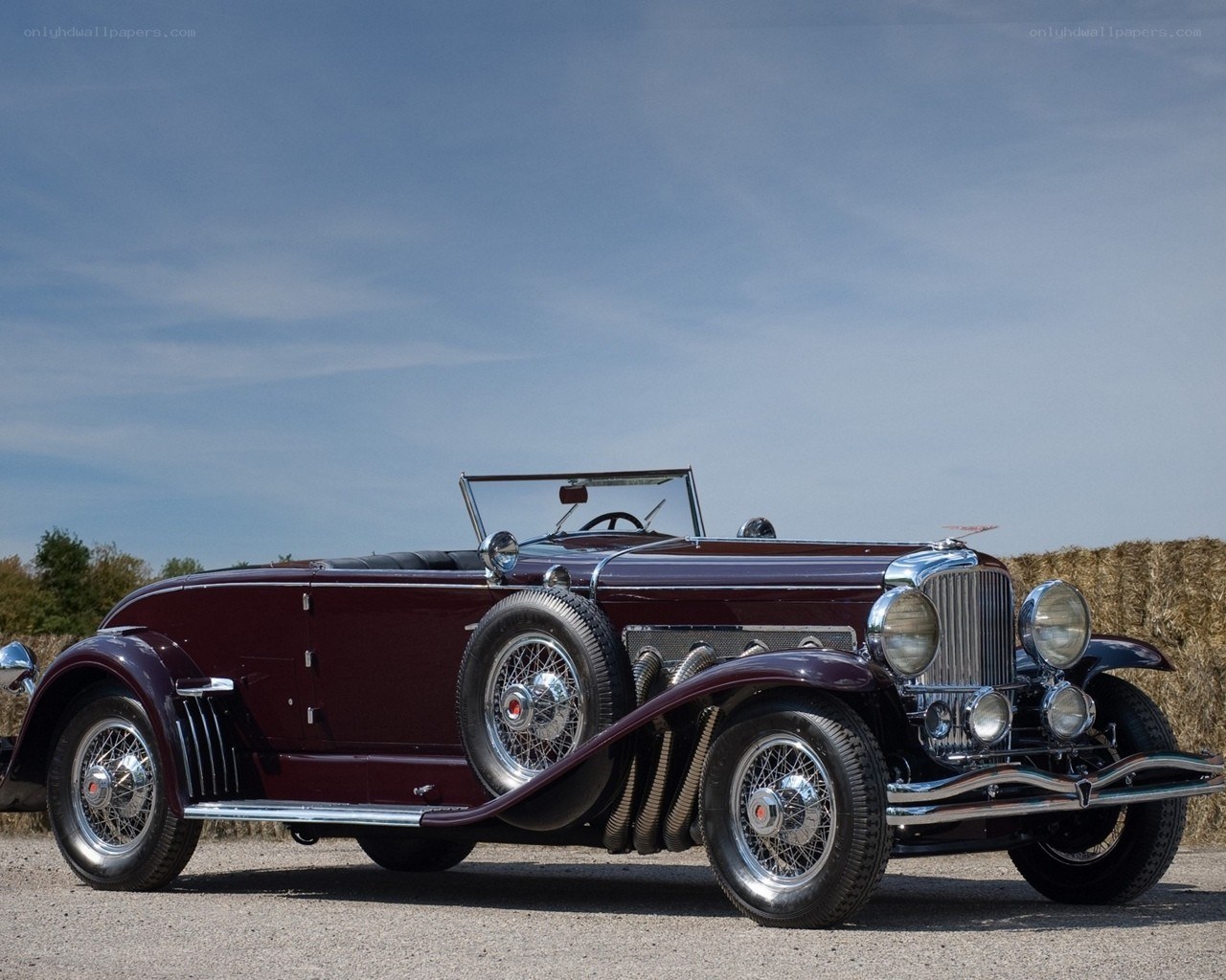 Classic maroon convertible car