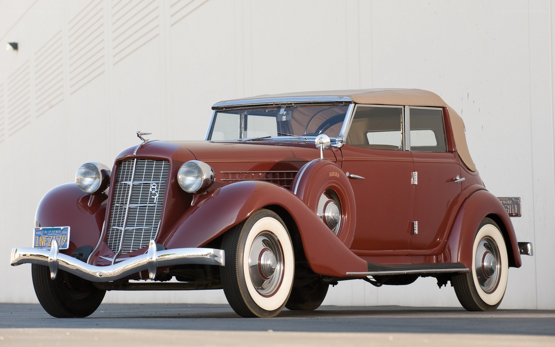 Classic maroon convertible car