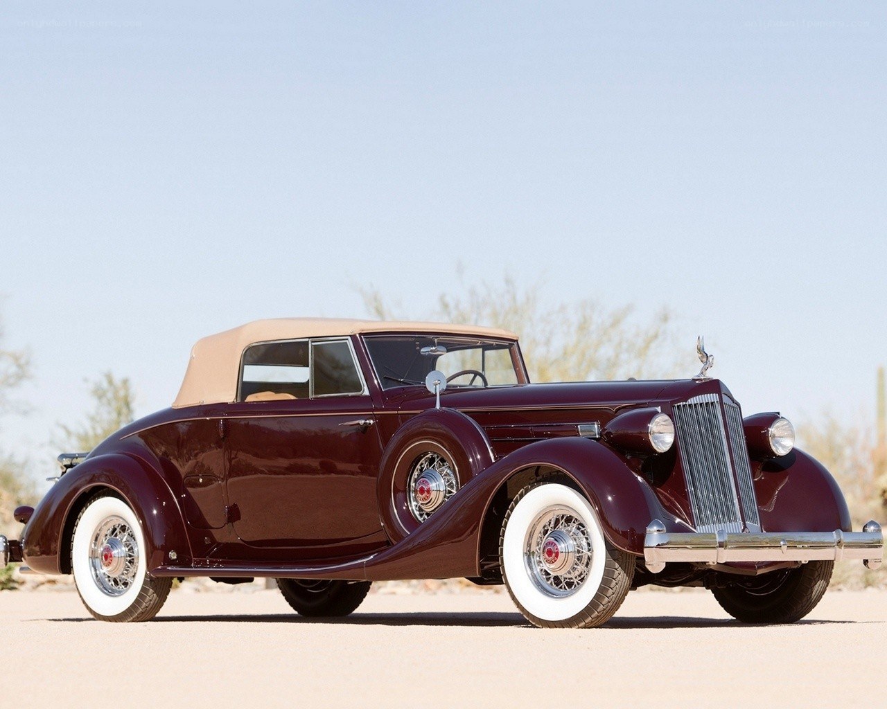 Classic maroon convertible car