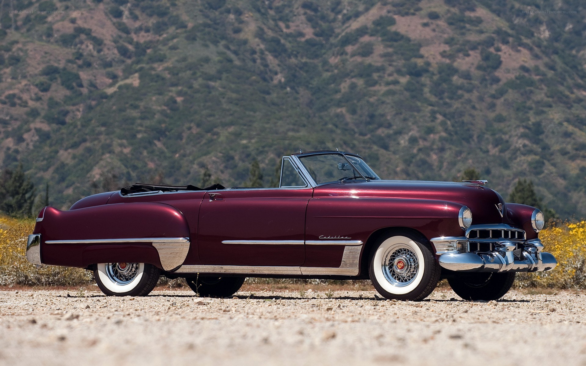 Classic maroon convertible car