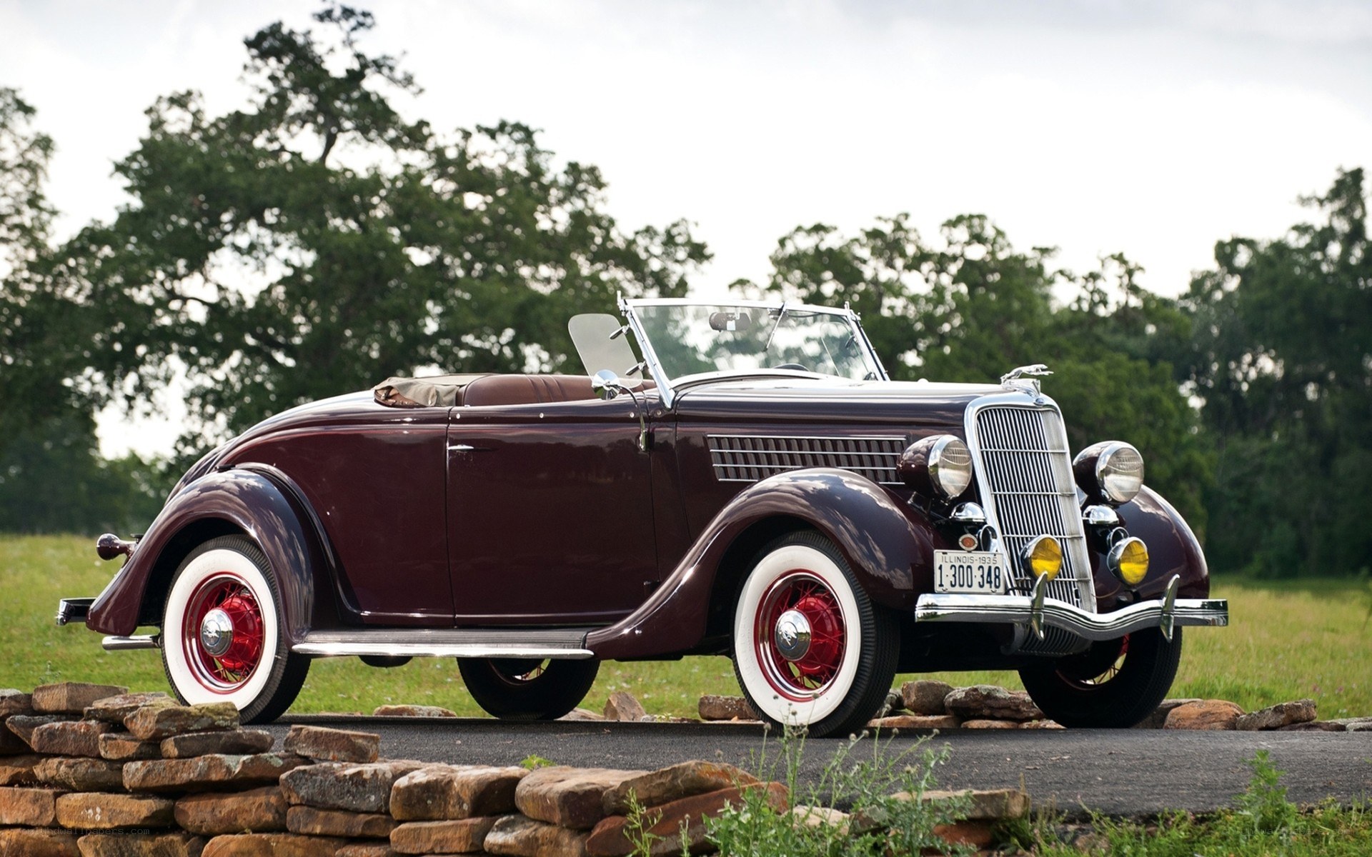 Classic maroon convertible car