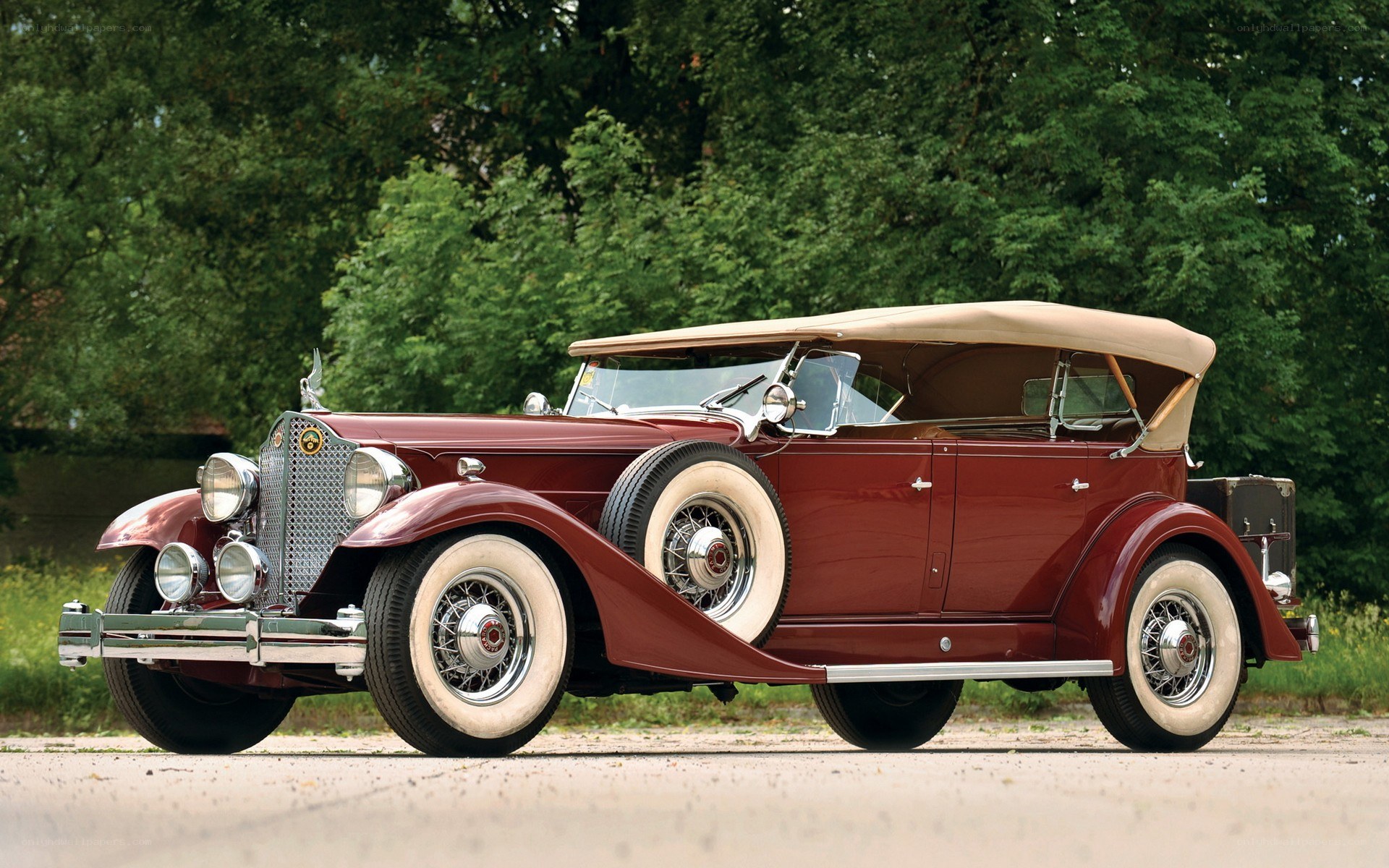 Classic maroon convertible car