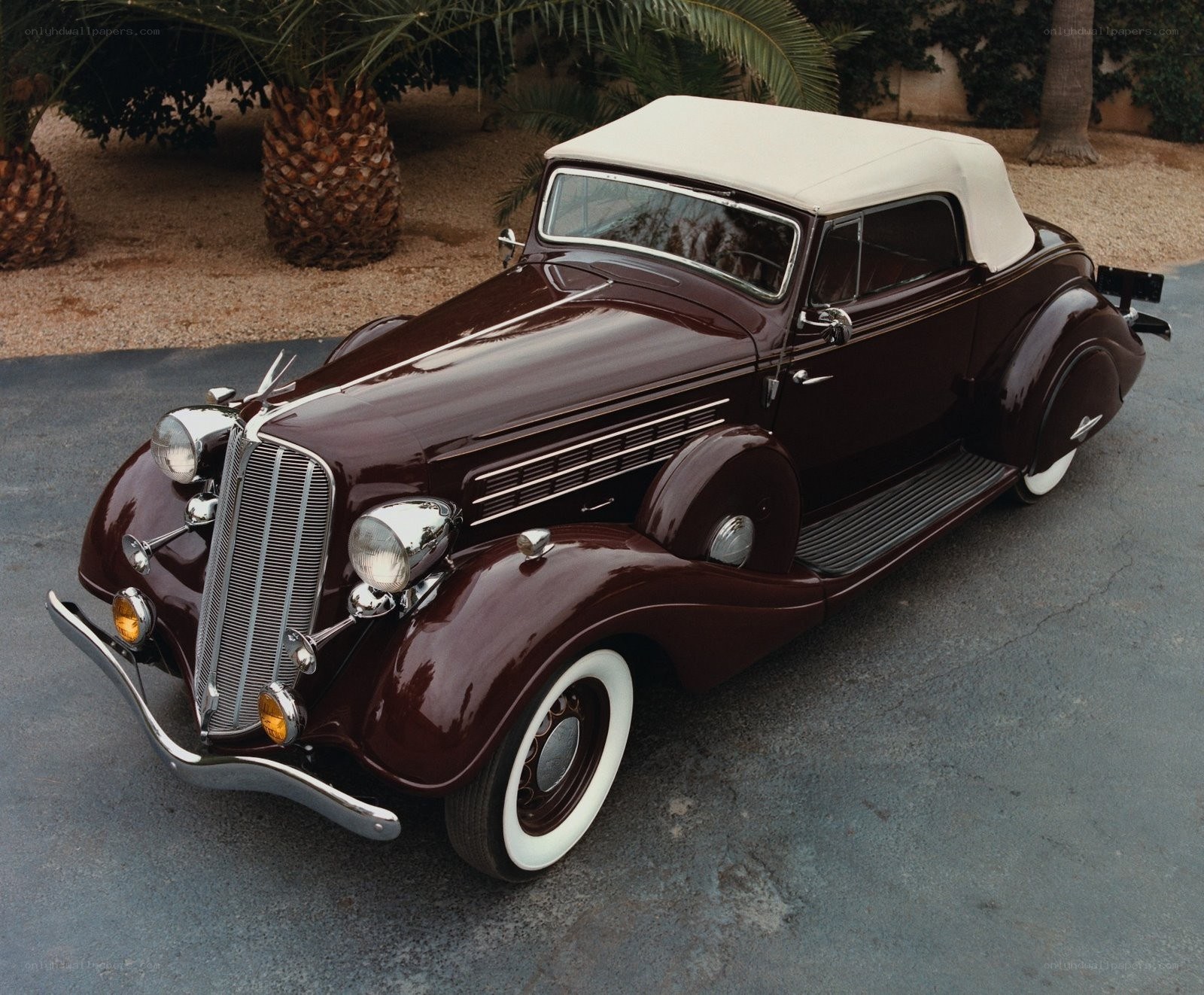 Classic maroon convertible car