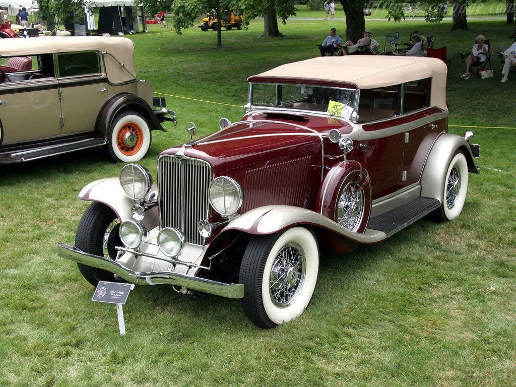 Classic maroon convertible car